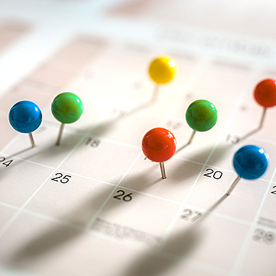 Coloured pins on calendar
